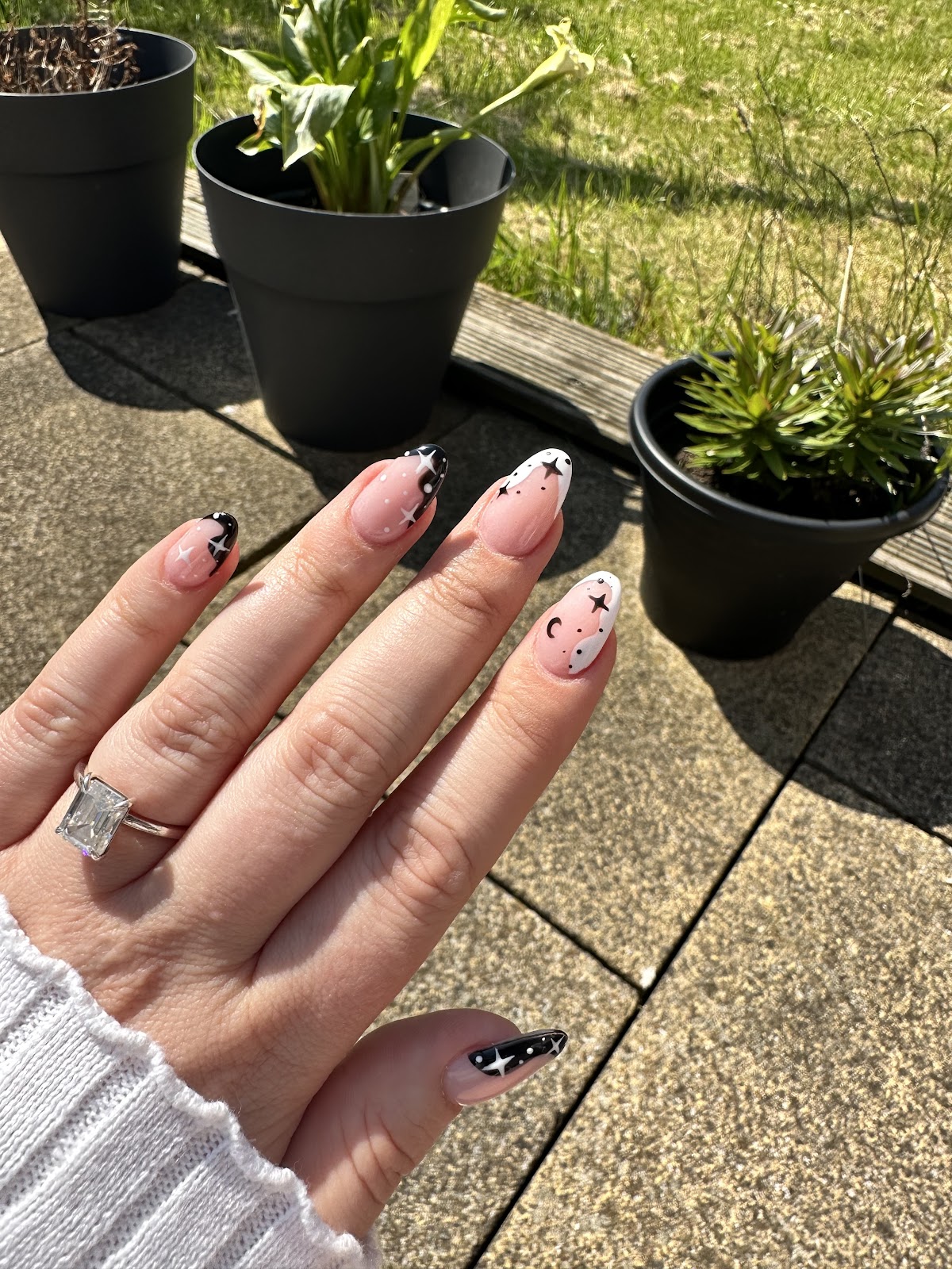 Black and white celestial star nail art